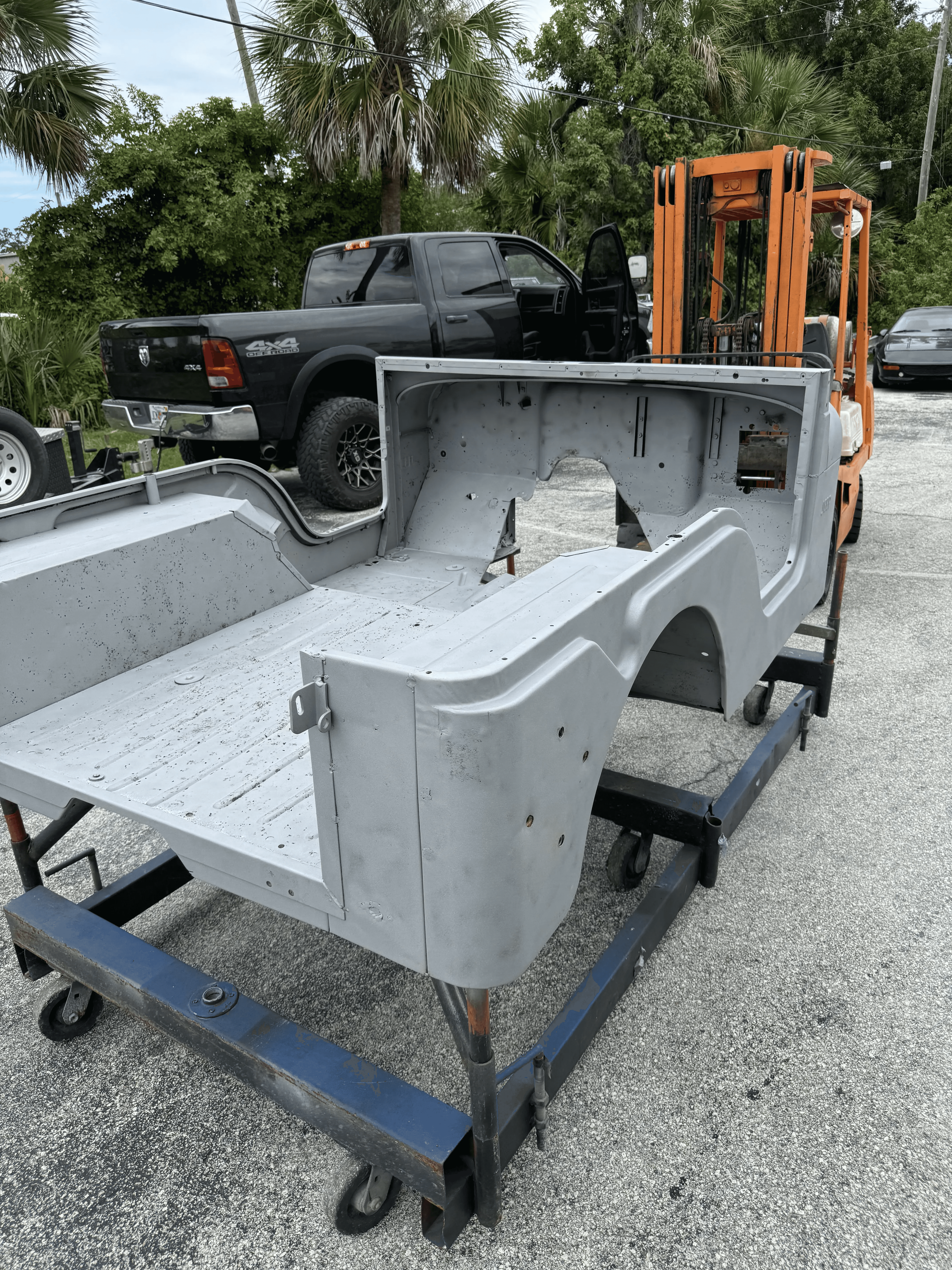 Automotive body tub after sand blasting removed paint and rust