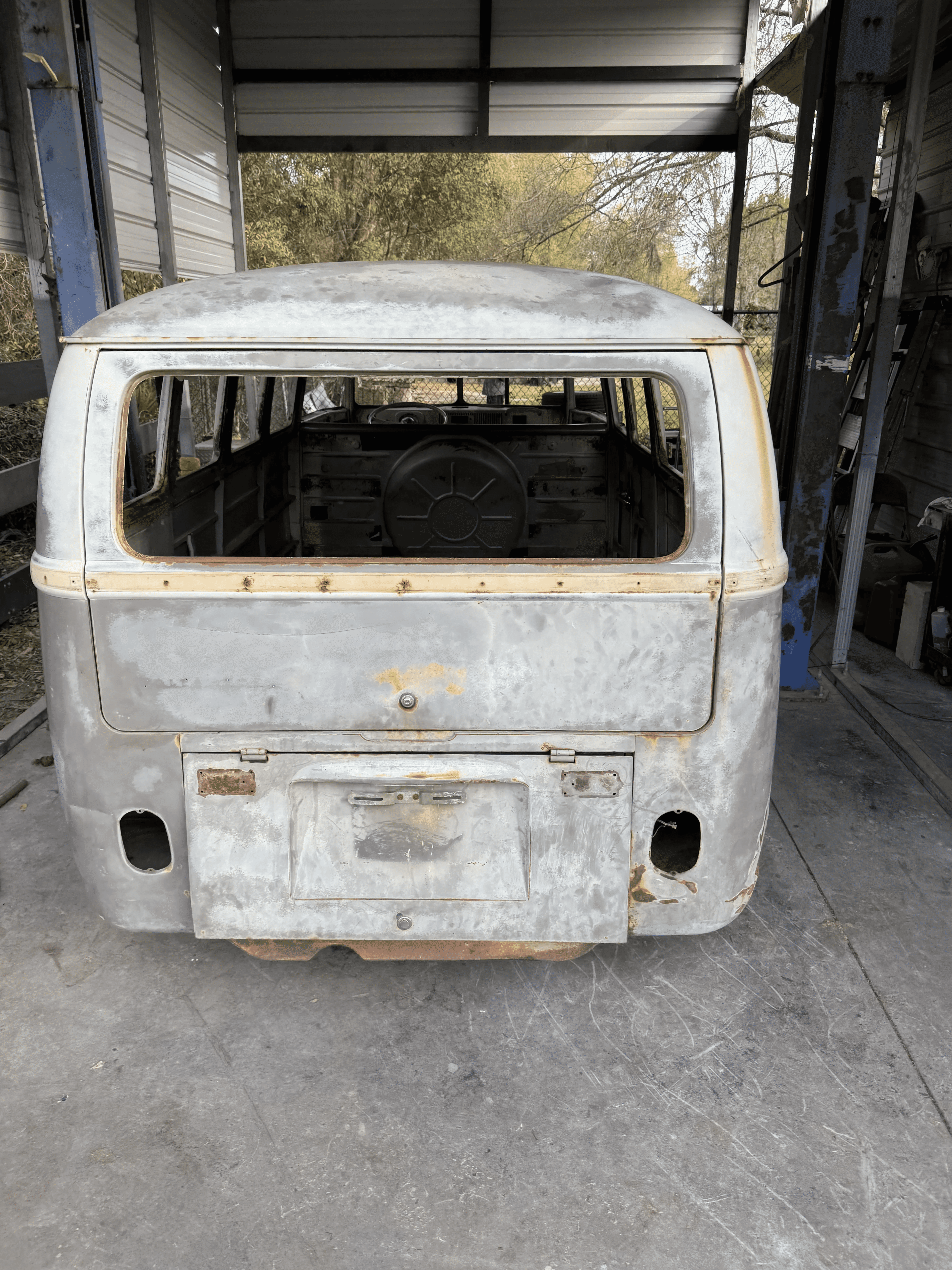 Classic van rear body panel before sand blasting