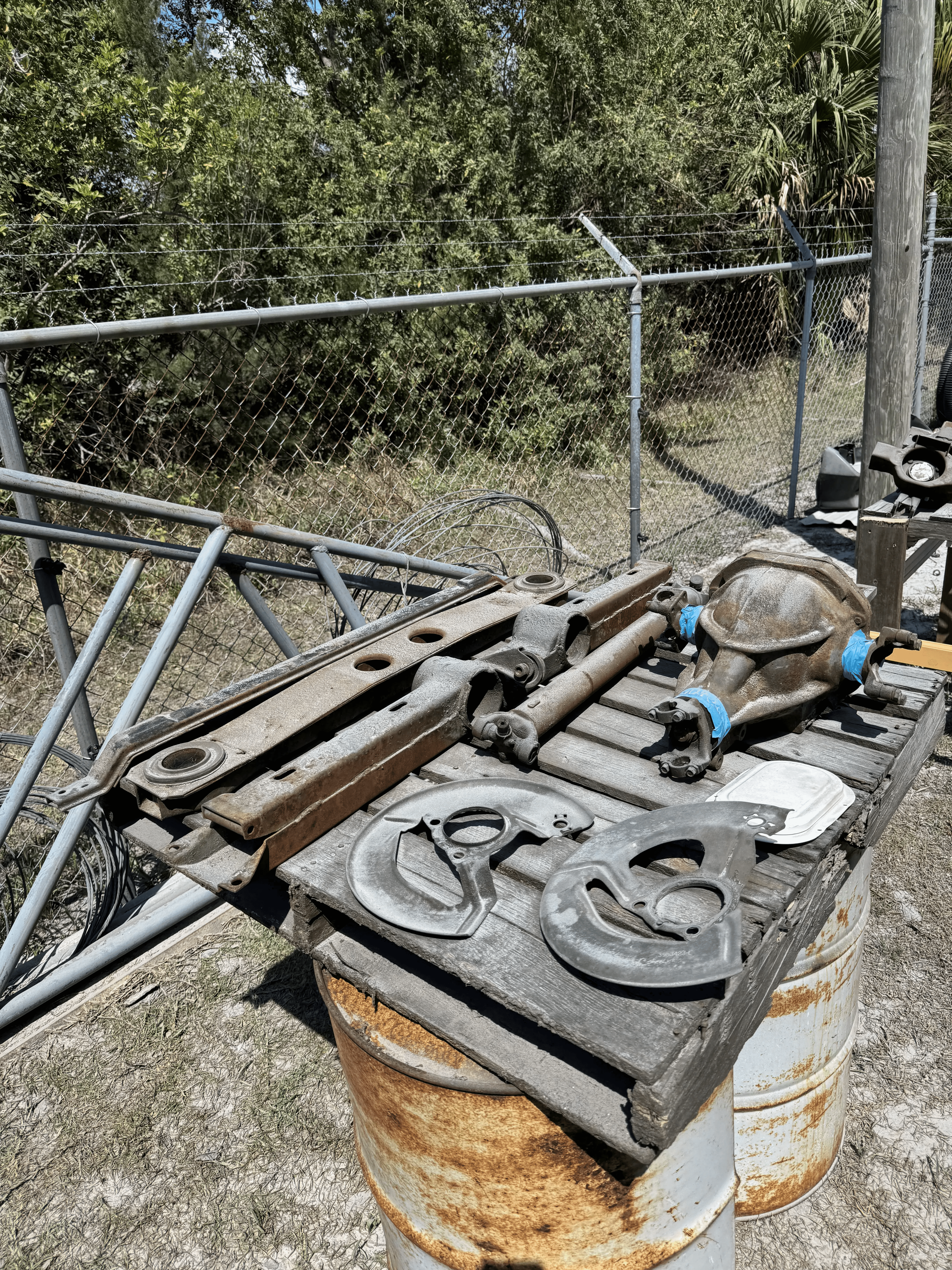 Automotive suspension parts with rust before sand blasting