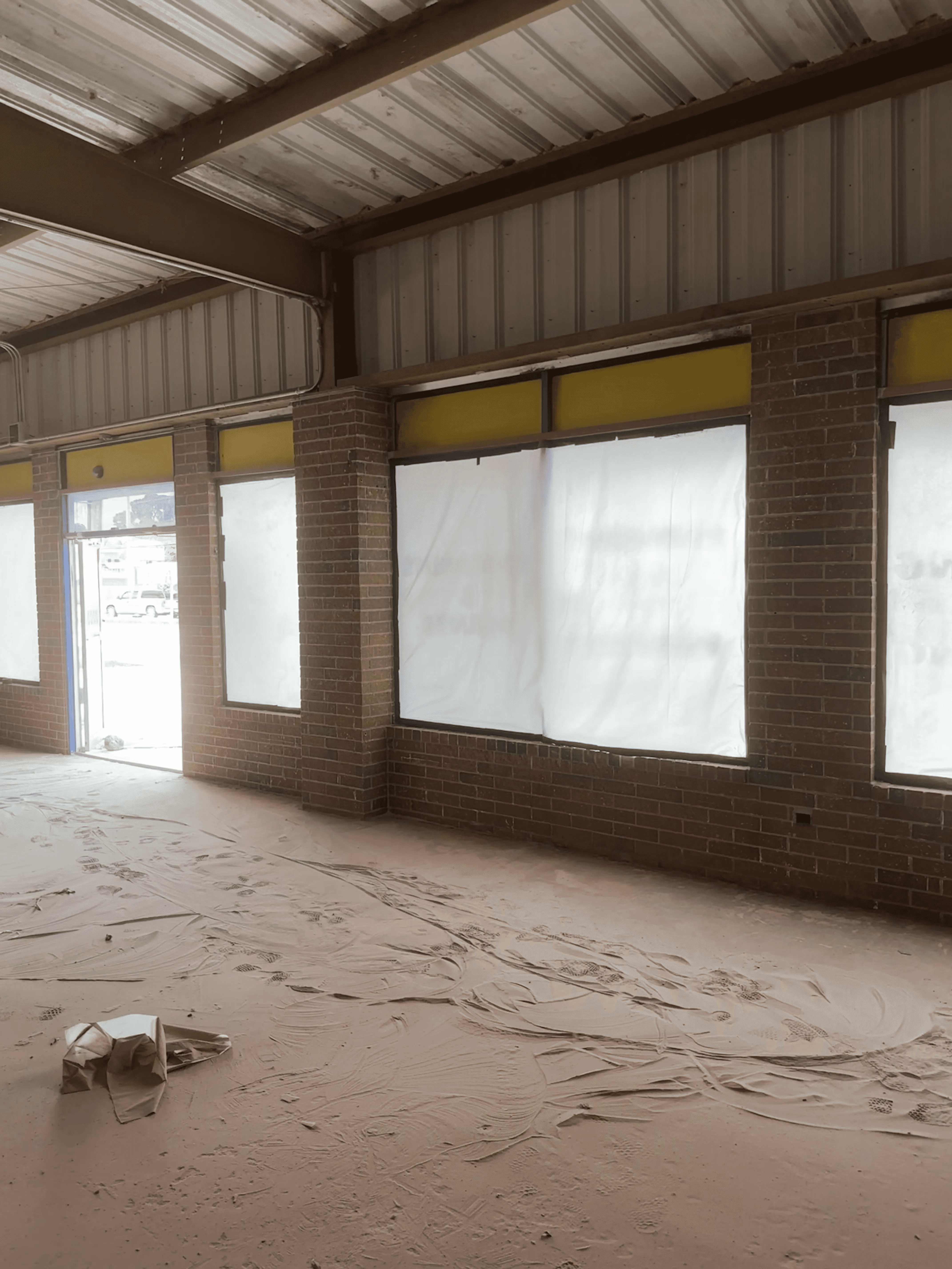 Interior brick and block wall after yellow paint removal